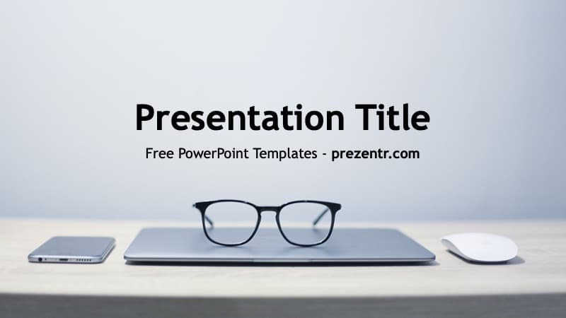 Workplace PowerPoint Template cover slide featuring glasses on a laptop with smartphone and mouse on a minimalist desk setup